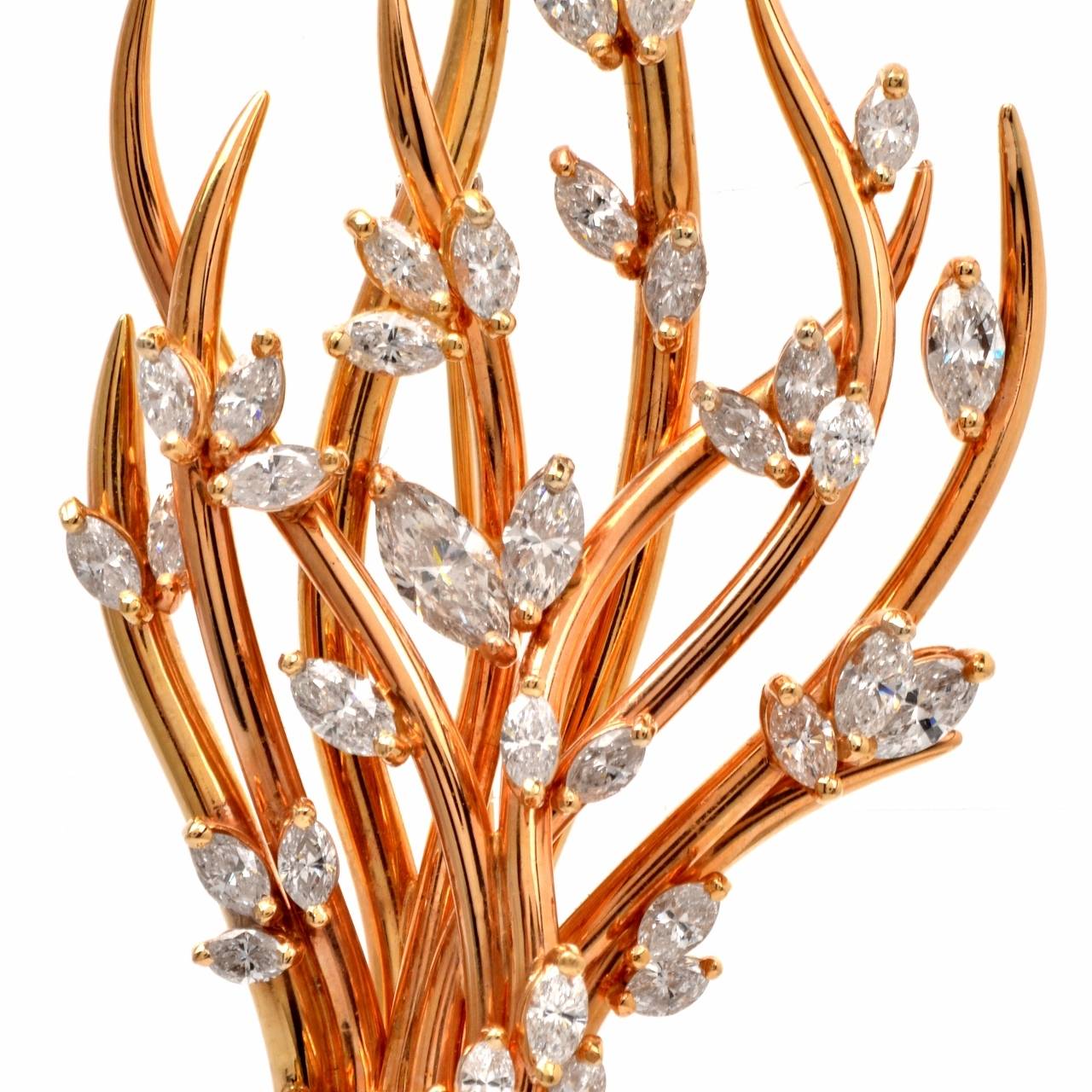 This lovely estate retro diamond branch design pin is crafted in solid 18K rose gold. This stunning pin is adorned with some 37 genuine marquise diamonds approx 6.00cts, H-I color, VS clarity, prong set. This item is in excellent