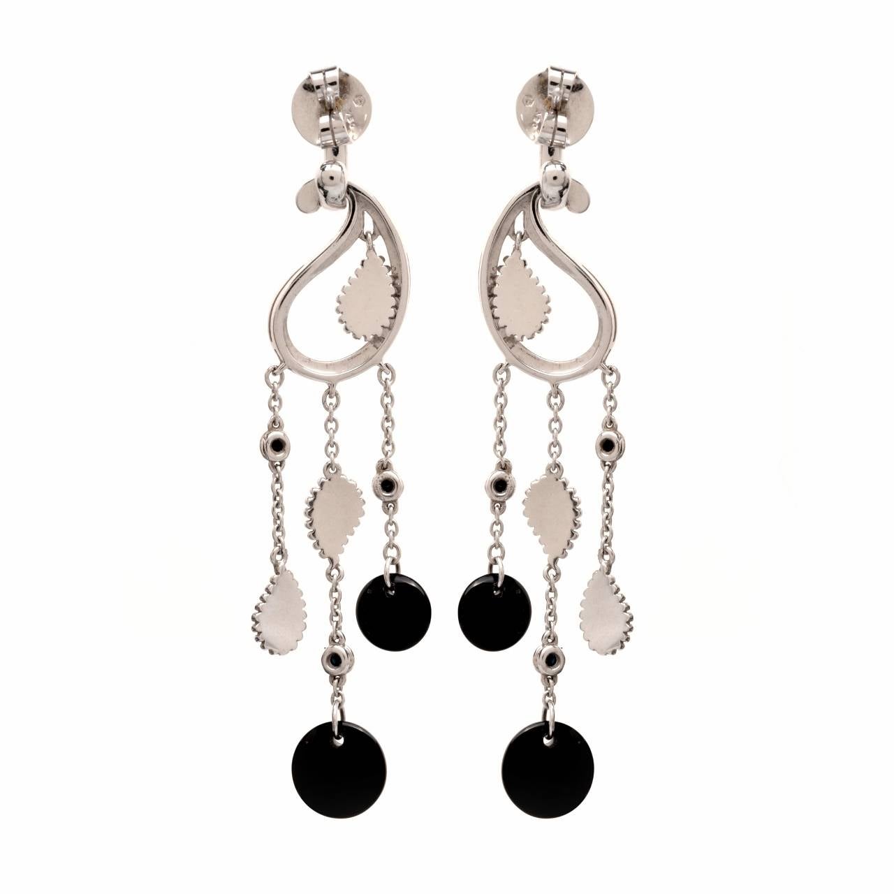 These lovely, 100% Original Carrera y Carrera drop earrings are crafted in solid 18K white gold. These earrings are accented with some 6 genuine bezel set black diamonds approx 0.30cttw and feature 4 genuine round Onyx approx 8mm-10mm in diameter.