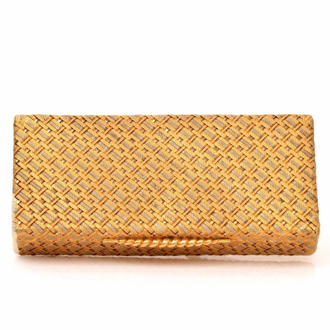This Van Cleef & Arpels cigarette / snuffbox of unsurpassed elegance and immaculate craftsmanship is of French provenance, crafted in solid 18K textured gold, simulating a basket weave pattern. It weighs 70.2 grams and measures 3.5" x