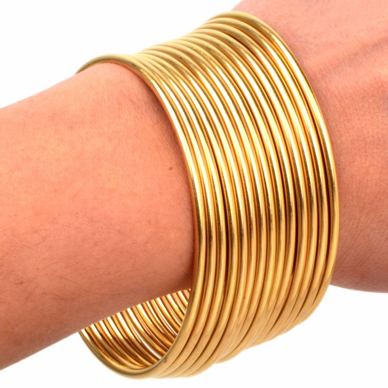 Stackable Gold Bangle Bracelets Set of 12 In Excellent Condition In Miami, FL