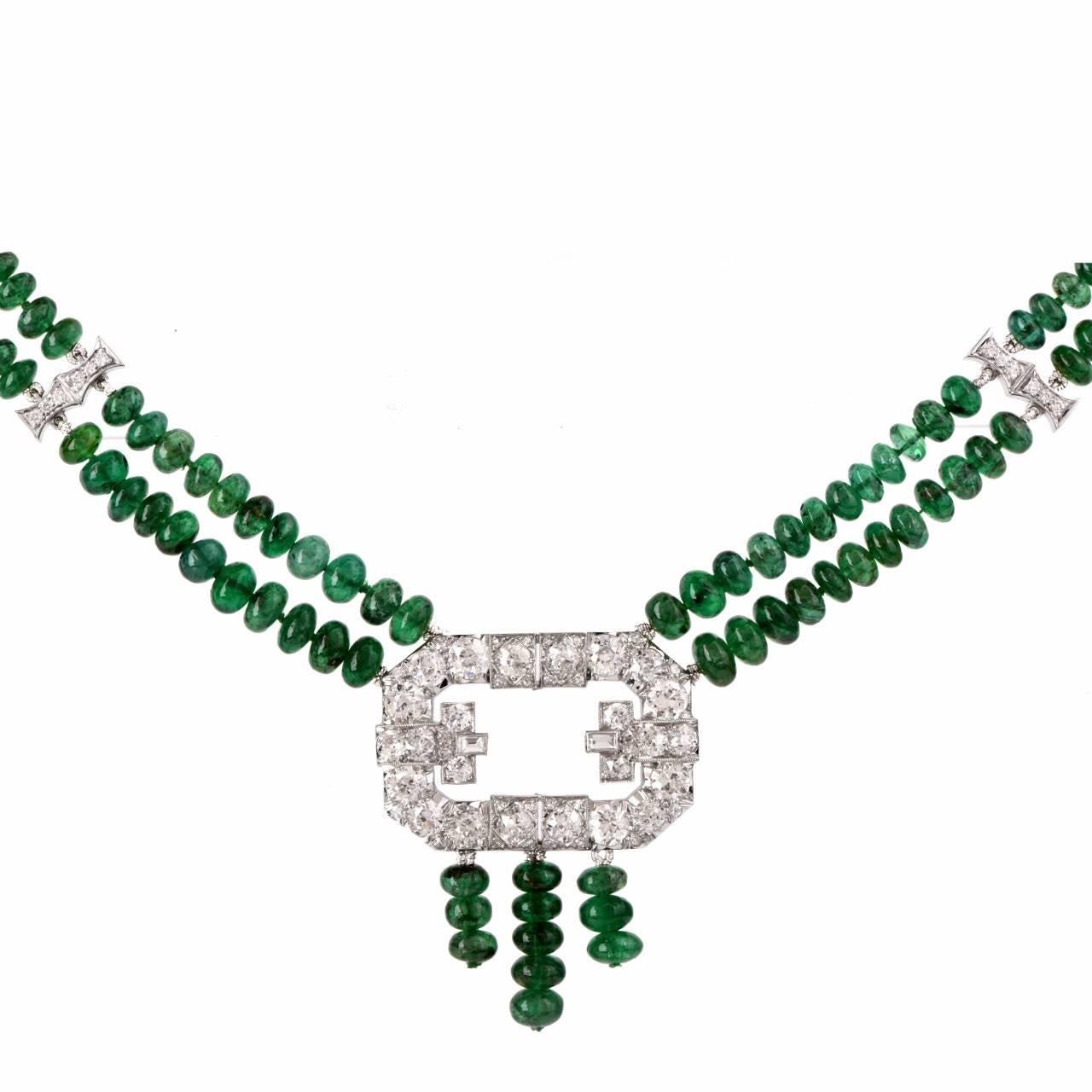 This absorbingly stunning vintage necklace with two strands of genuine emerald beads and an octagonal diamond encrusted decor is crafted in platinum, weighing 42.2 grams and measuring 19