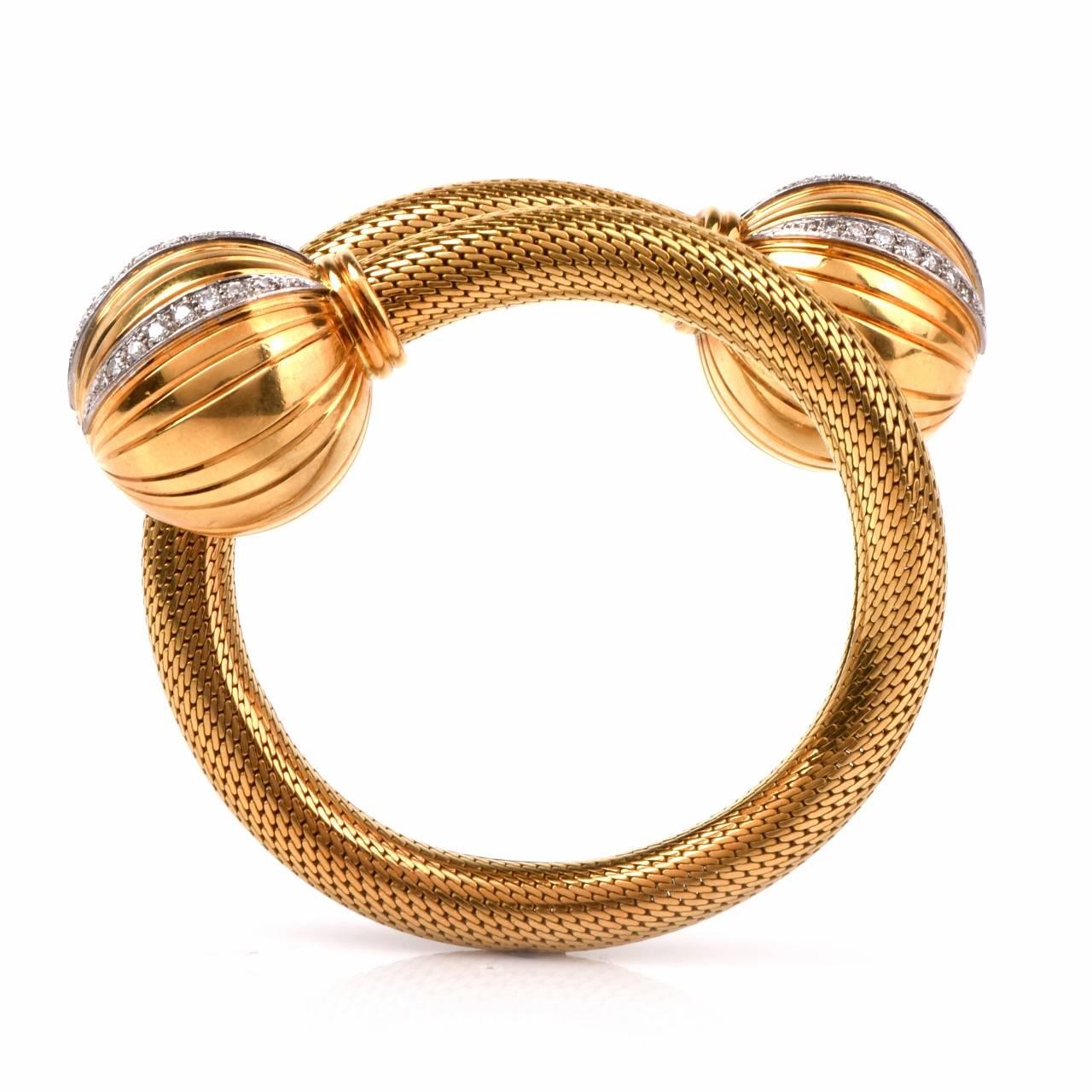 This Vintage Retro cuff bracelet of flexible construction is rendered in solid 18K , textured yellow gold. Designed as a snake pattern bracelet , it is expandable from 6 1/2