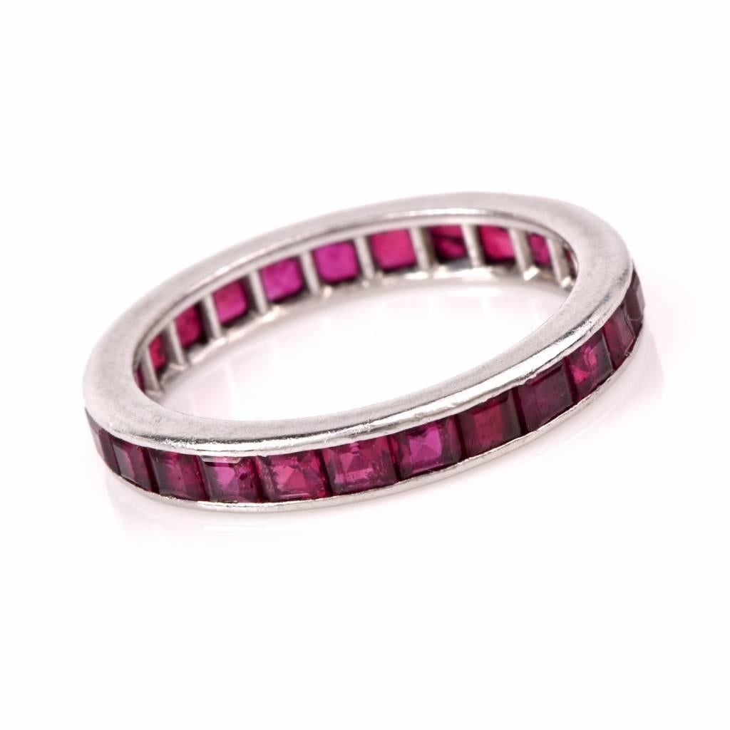 This antque deco eternity band is crafted in solid platinum, channel set throughout with genuine square step cut rubies. The vivacious genuine corundum weigh cumulatively 1.78cts. This eternity band is a size 4.1/2 and remains in very good