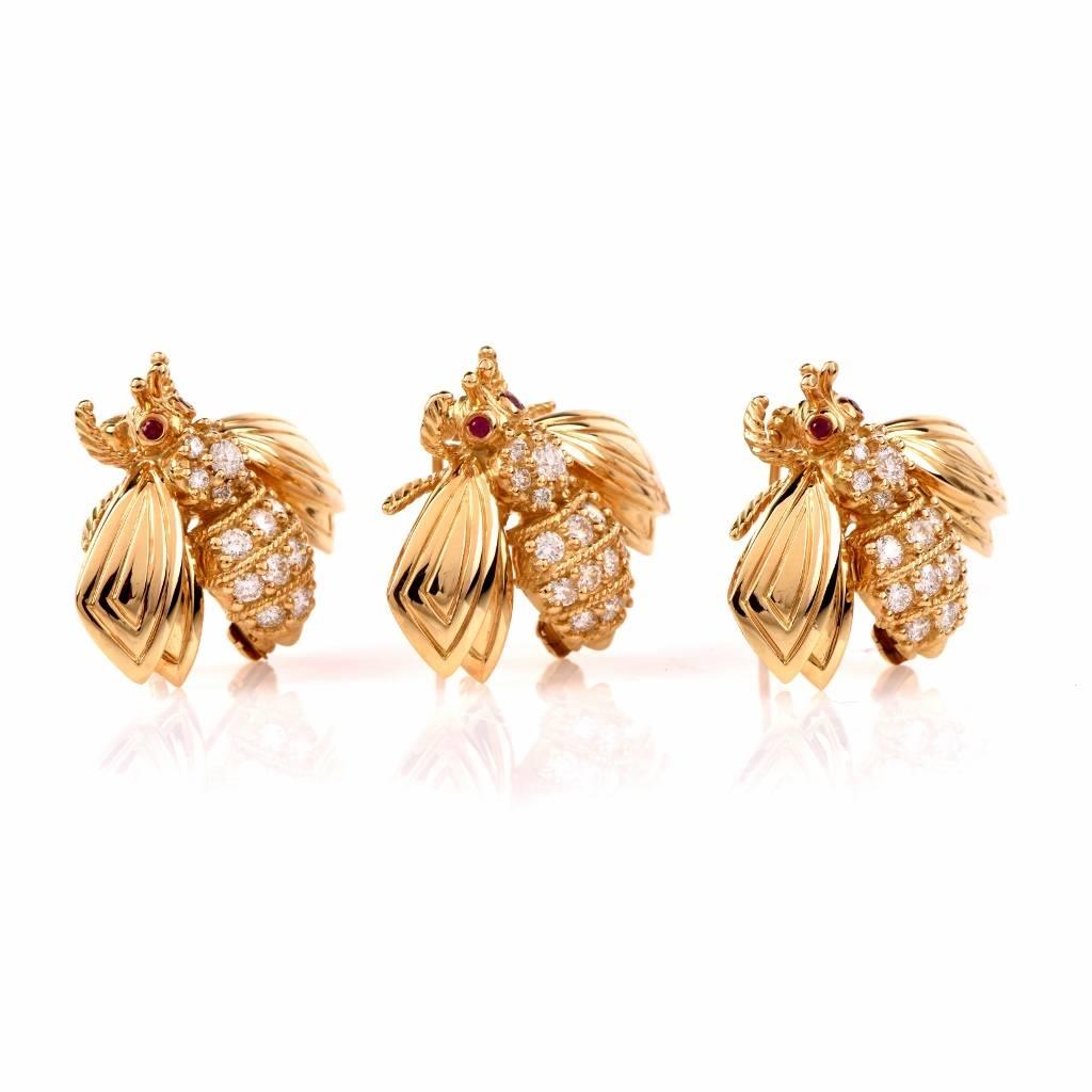 These authentic  Tiffany & Co. enchanting three delicate bees in solid 18K yellow gold, the three weighing totally 23.5 grams, each measuring  25 x 21 mm. The tiny insects are adorned on their entire thorax with a total of 51 round-faceted diamonds,