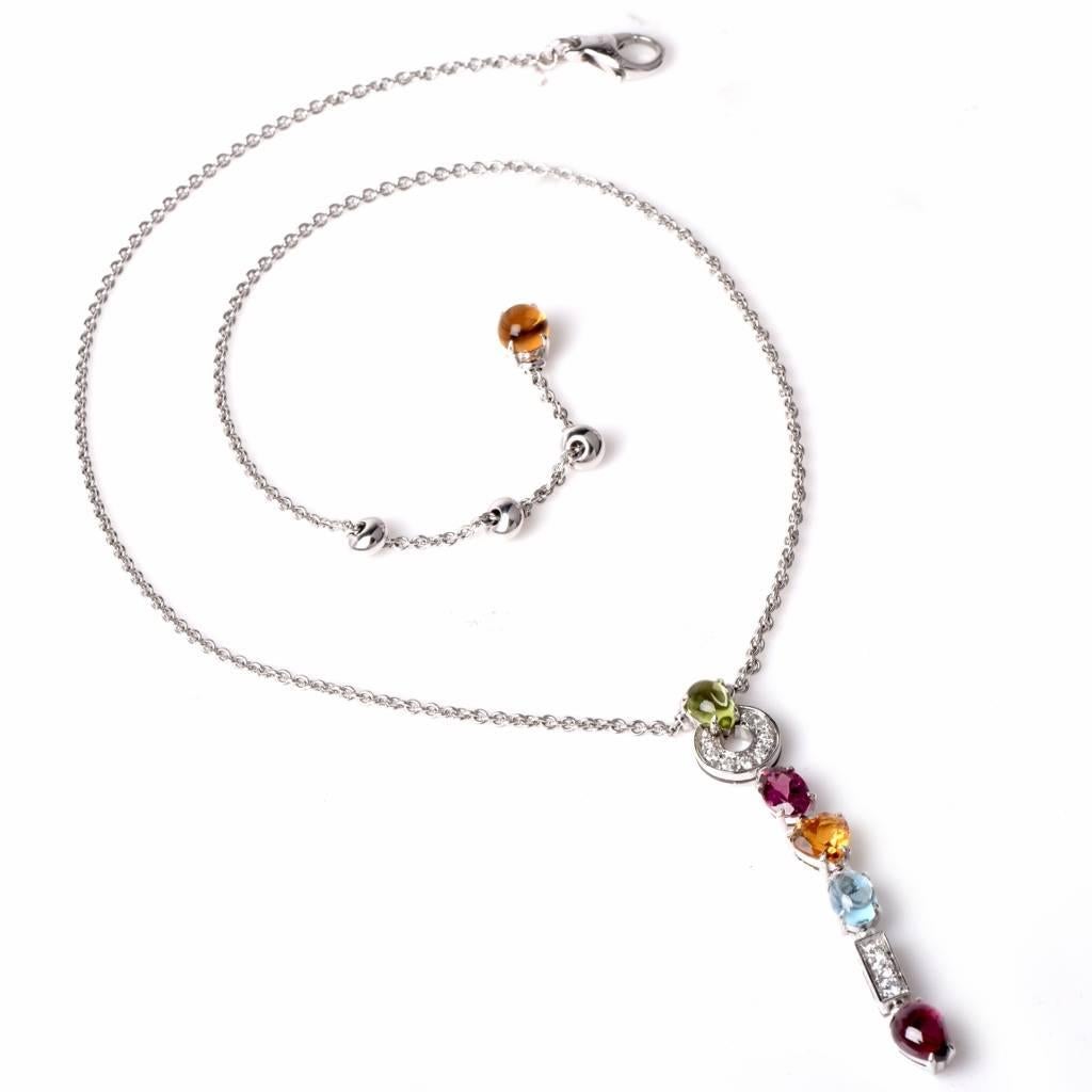 This stunning authentic Bvlgari Allegra multi colored gemstone and diamonds necklace is crafted in 18 K white gold,  incorporating a vertical  charm pendant measures about 2.25
