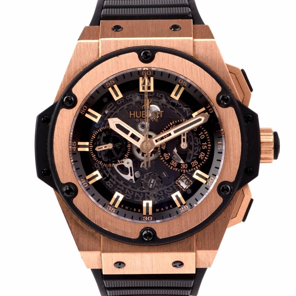 18k rose gold case  and black rubber bracelet. Skeleton dial with rose gold tone hands and index hour markers. Minute markers around the outer rim. Date display between the 4 and 5 o'clock position. Automatic movement. Scratch resistant sapphire