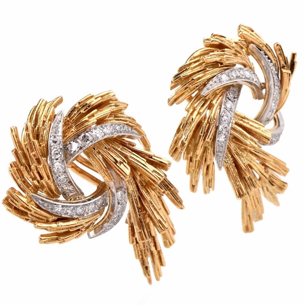 These vintage floral spray earrings  of unmatched elegance and refinement  are  crafted in artfully textured solid 18K yellow gold, simulating botanically accurate petals and stems. They weigh 20.2  grams and measures approximately 33 mm long and 22