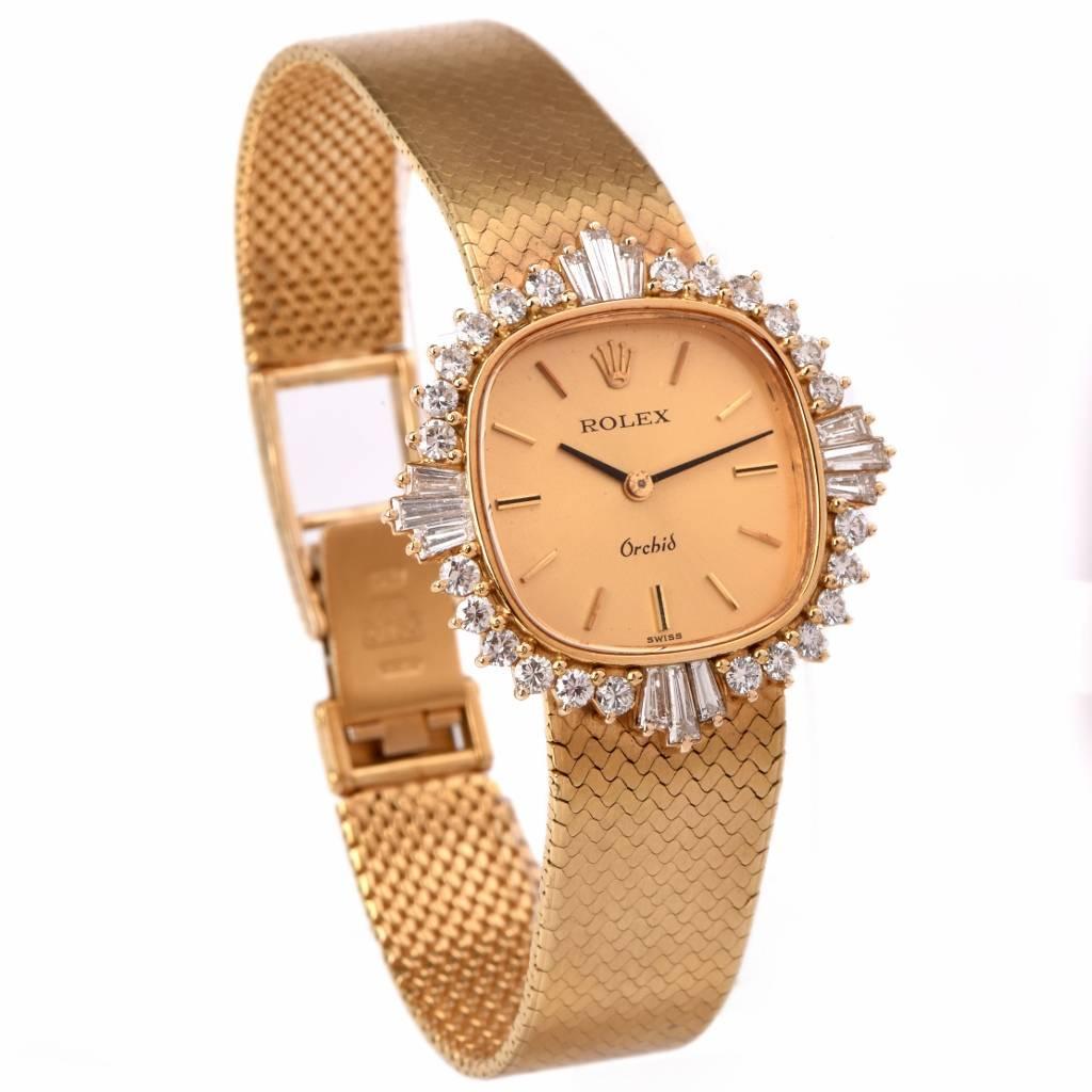 Authentic circa 1973 ladies Rolex Orchid wrist watch with 18K yellow gold rounded square case and integrated 18K yellow gold textured matted gold bracelet of Italian provenance; bezel adorned with 12 tapered baguette and 24 round brilliant-cut