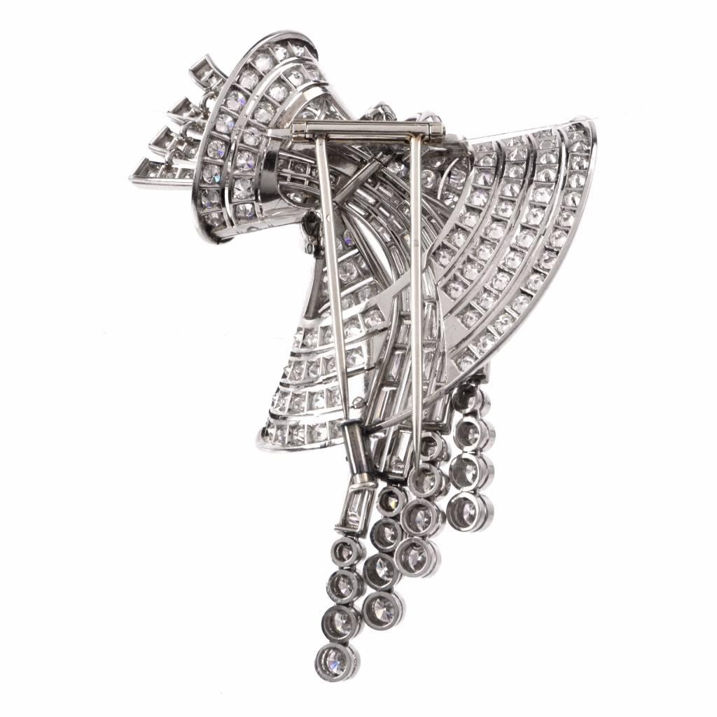 This beautiful vintage diamond brooch pin crafted in solid platinum. Displaying a delicate swirl design with exquisite details and exceptional workmanship, this unique brooch pin is embellished with some 194 genuine Round cut dazzling Diamonds