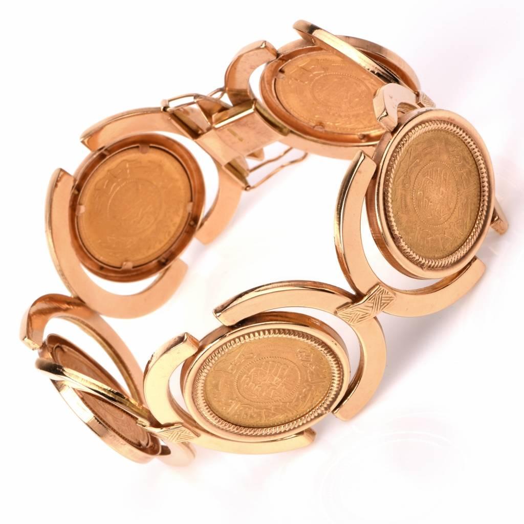 Thiscine coin gold bracelet of immaculate workmanship in crafted in solid 18K yellow gold, weighing 89.3 grams and measuring 8