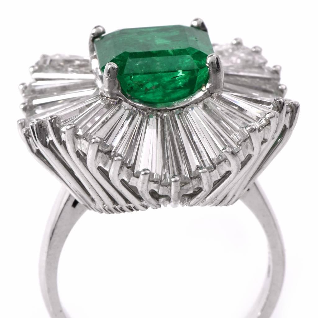 This sumptuous cocktail ring/pendant with an eminent GIA certified square emerald-cut  genuine emerald is crafted in solid platinum and weighs 14.9 grams.  The centrally positioned vibrant transparent emerald weighs approx. 3.15 cts   and measures 
