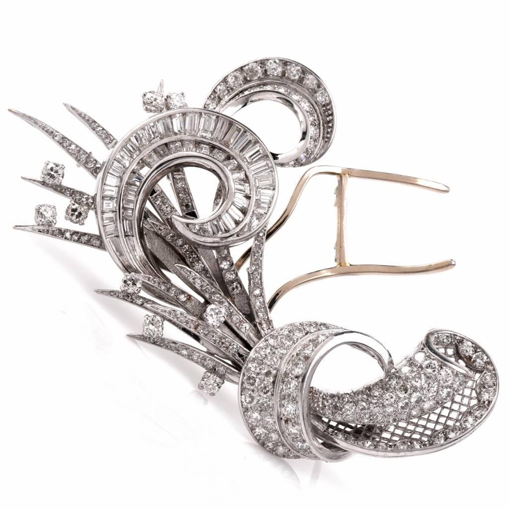  Vintage diamond lapel brooch with three detachable constituents is crafted in solid platinum. Weighing approx. 78 grams. Designed as a naturalistically inspired brooch, it incorporates an immaculately rendered ribbon-bow with delicate scrolls and