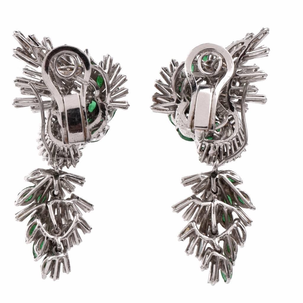 These captivating vintage earrings of sophisticated and refined aesthetic may be wornas day-time clip-back or as evening pendant earrrings, crafted in solid platinum.  In absorbing naturalistic design, these earrings expose a cluster of floral motif