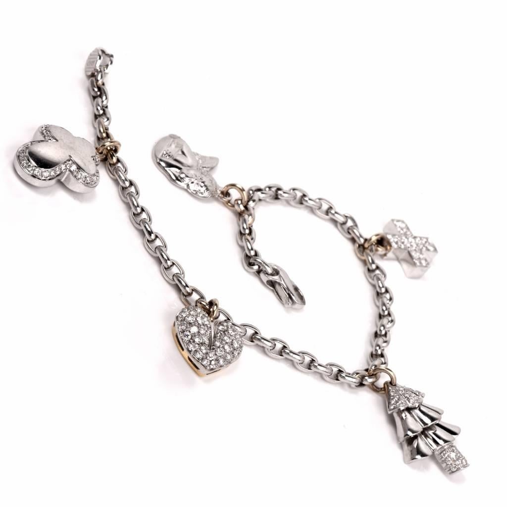 This very attractive charm bracelet is crafted in 18K white gold and composed of interlocking ovular links. This unique  bracelet  is enhanced by five charms: an angel, a pine tree, a cross, a leaf and a stylized cross motif profile, some covered in