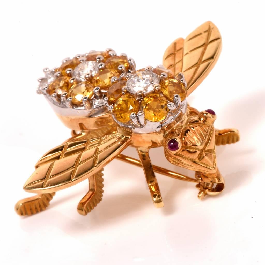 This adorable high quality estate bee brooch pin is crafted in solid 18K gold and weighs 11.3 grams. The detailed body displays 5 genuine round cut diamonds approx 0.85cts, G-H color, VS1-VS2 clarity accented with 12 genuine round cut yellow