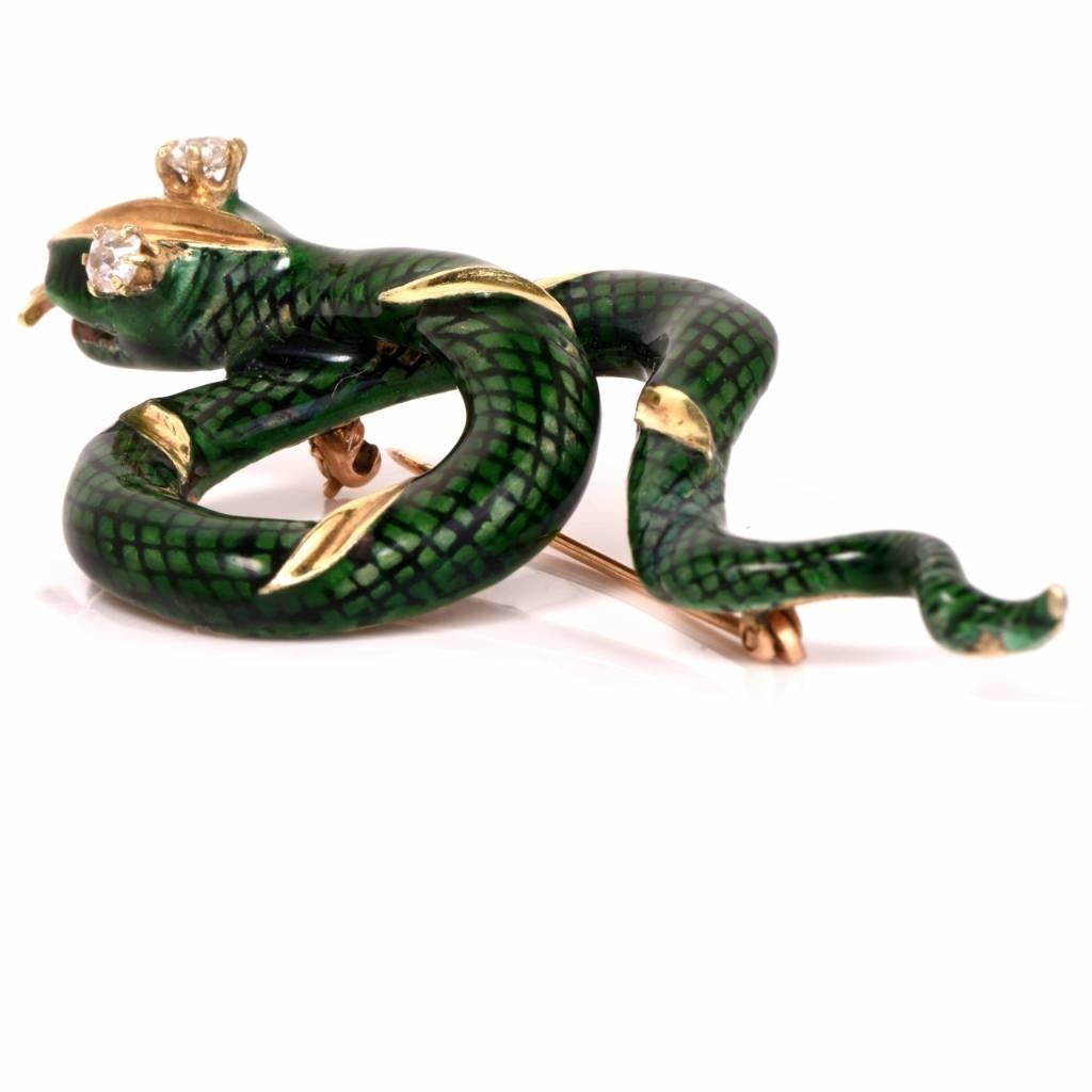 This enchanting Diamond enamel brooch pin is crafted in solid 14K yellow gold. Showcasing a French green enameled snake set with 2 genuine antique old mine Round cut Diamonds of approx: 0.35 cttw, I-J color, Vs1 clarity, prong set, this animal