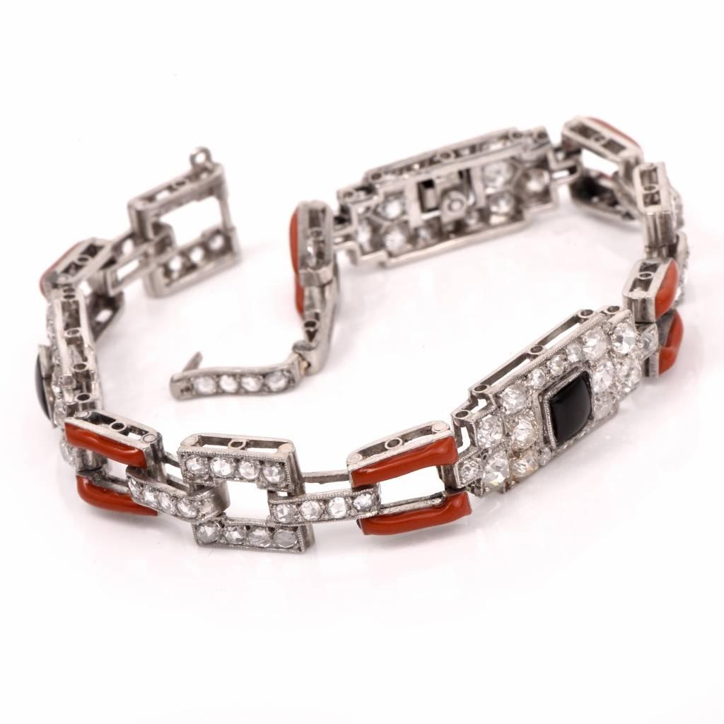 This antique Art Deco bracelet with geometric links is crafted in solid platinum. It is cumulatively adorned with approx. 5.44 cts of round diamonds, graded H-I color and VS1-SI1 clarity. The three rectangular links are enhanced by black square onyx