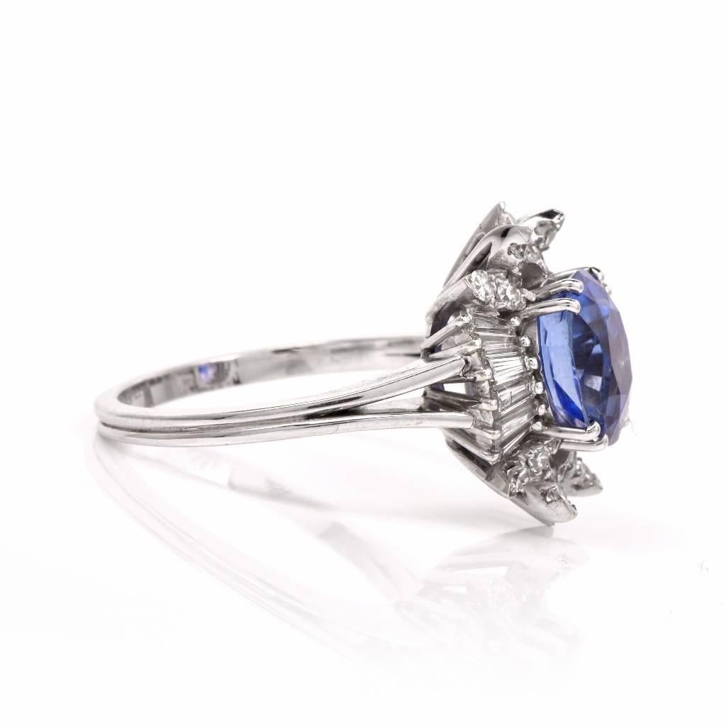 This captivating diamond ballerina ring is crafted in solid platinum, weighing approx. 5.5 grams and measuring 16mm wide by 9mm high. It showcases a fine genuine Natural No Heat Ceylon oval shape sapphire of approx. 3.42cts, of a beautiful royal