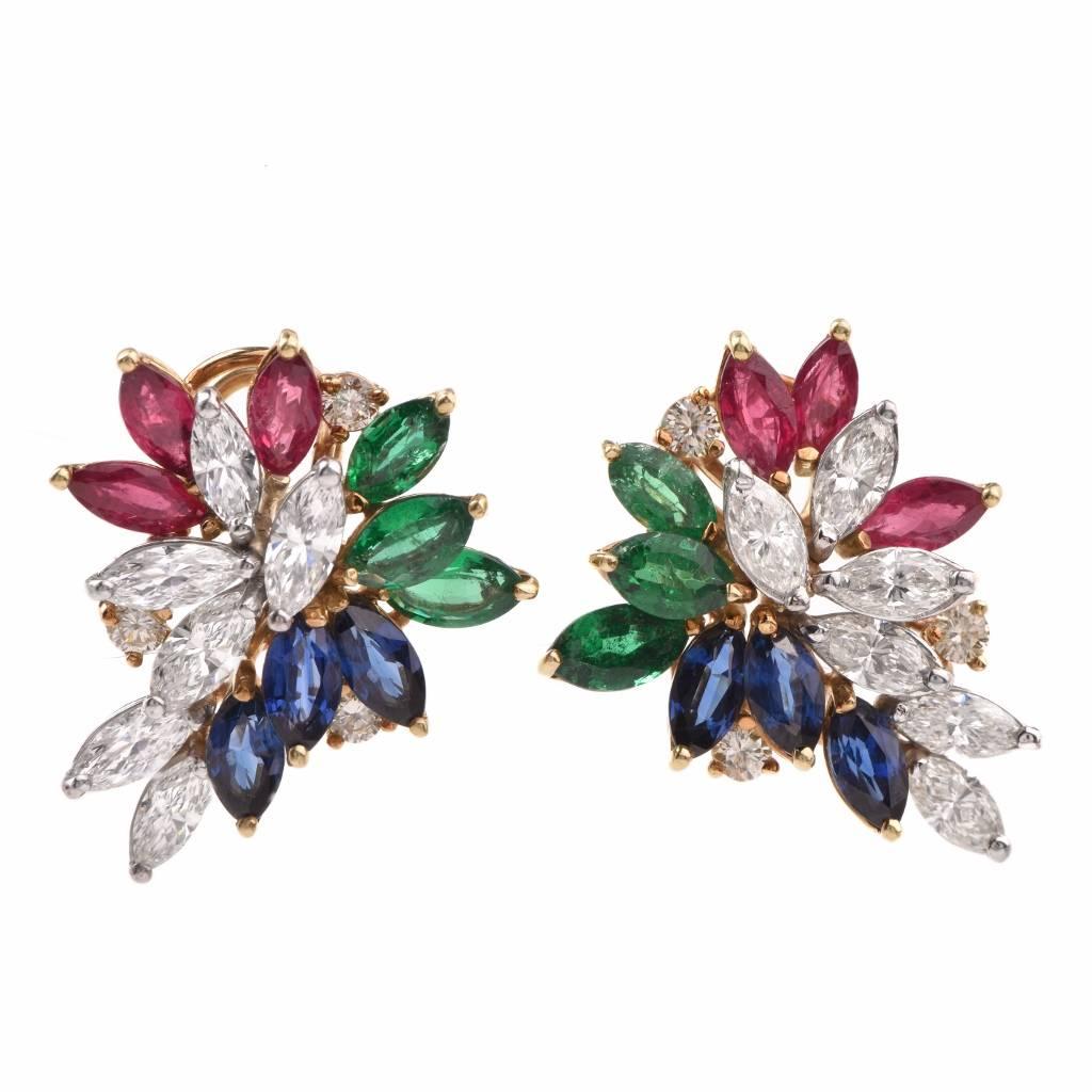 These glamourous multi-gem cluster earrings are crafted in solid 18K yellow gold and incorporate 12 marquise and 4 round-faceted diamonds, all approx. 4.44cttw, H-I color, VS1-VS2 clarity; 6 faceted marquise emeralds of intense green color approx.
