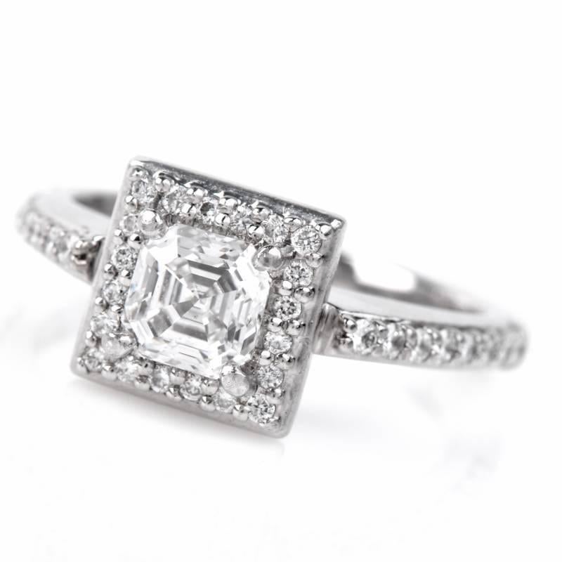 This elegant Art Deco style ring is crafted in solid 18k white gold. The center exhibits an Asscher Cut diamond with inscription, weighing approx. 0.75 carats (GIA certificate #15099042), measuring 5.12 x 5.01 x 3.38mm, graded D color,  SI1 clarity.