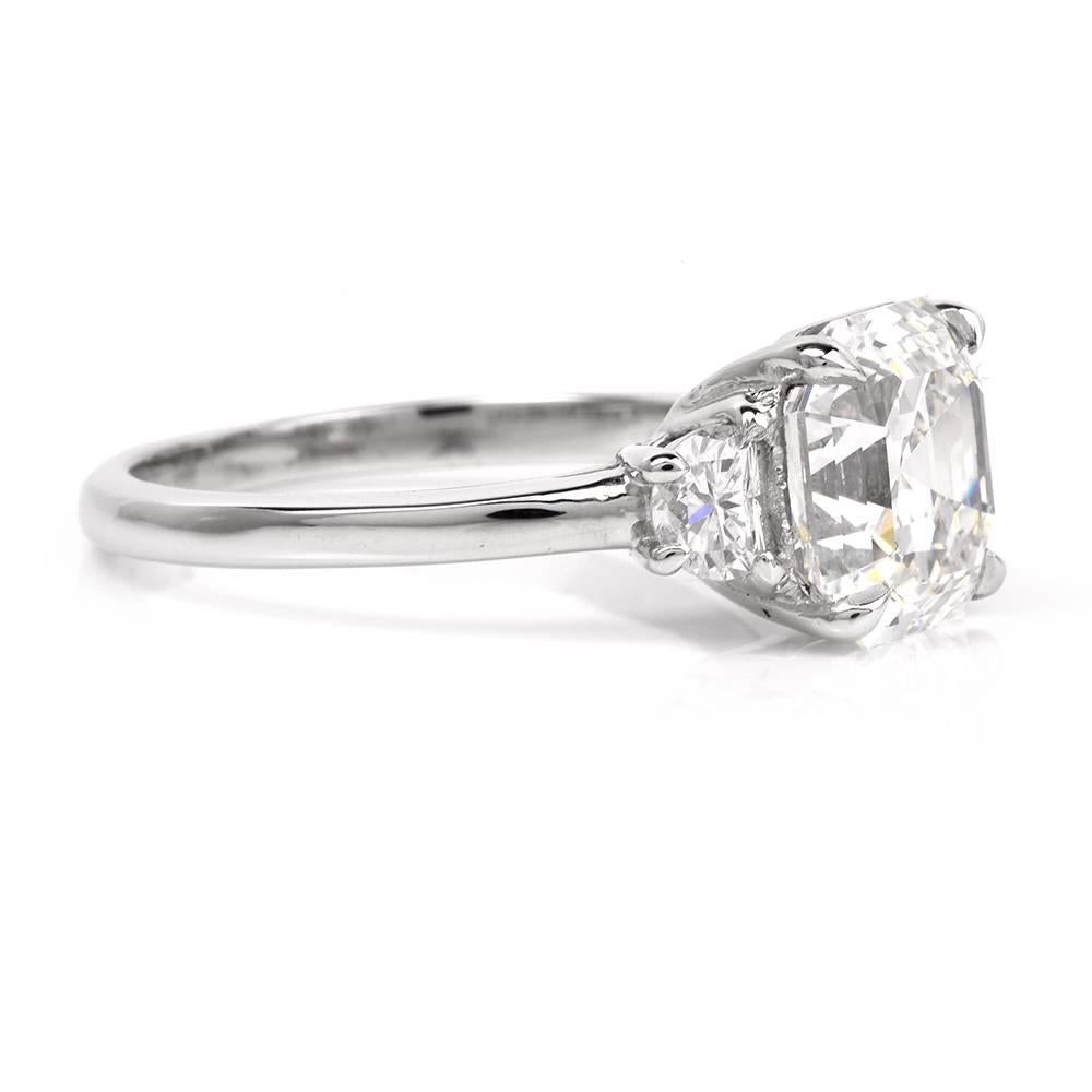 Art Deco Certified 3.17 Carats Asscher Diamond Three Stone Platinum Engagement Ring