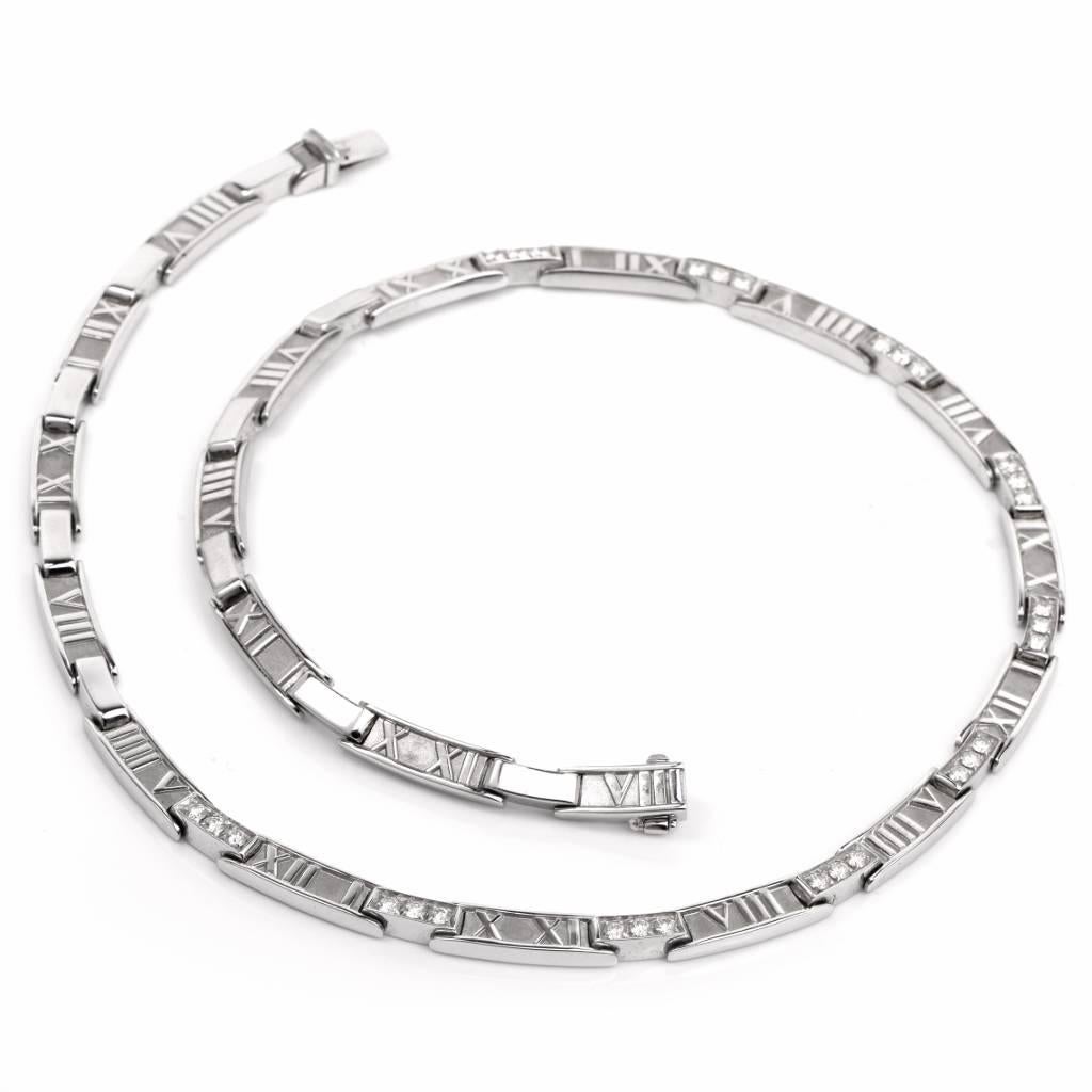 This fabulous link necklace from Tiffany & Co. 'Atlas' collection is crafted in 18K white gold and exposes roman numerals all around, adorned with 30 round cut genuine Tiffany diamonds of approx. 1.65cttw, graded F-G color, VVS1-VVS2 clarity. This