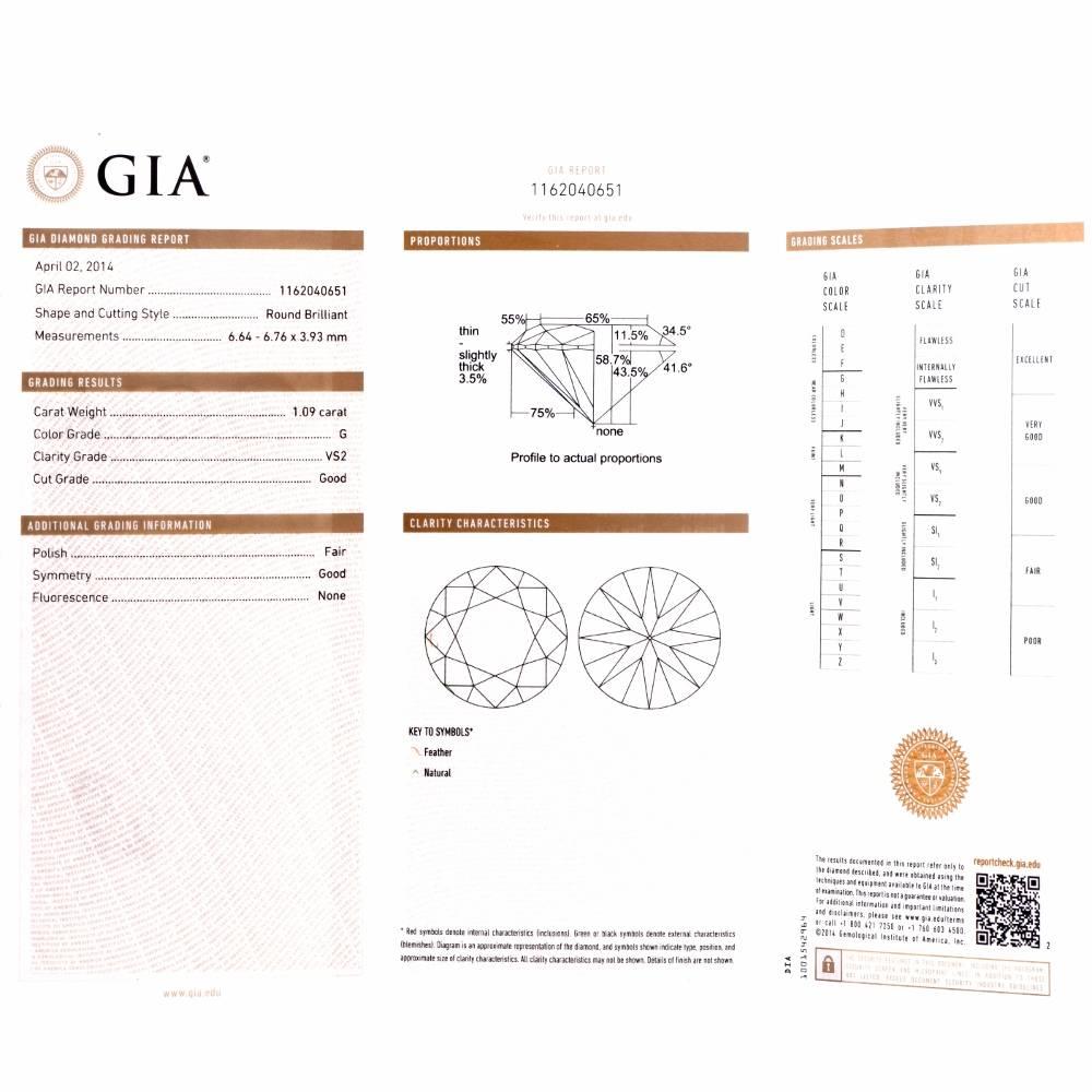 GIA 2.13 Carat Extra White E-F, VS2 Diamond  18k Gold Stud Earrings In Excellent Condition In Miami, FL