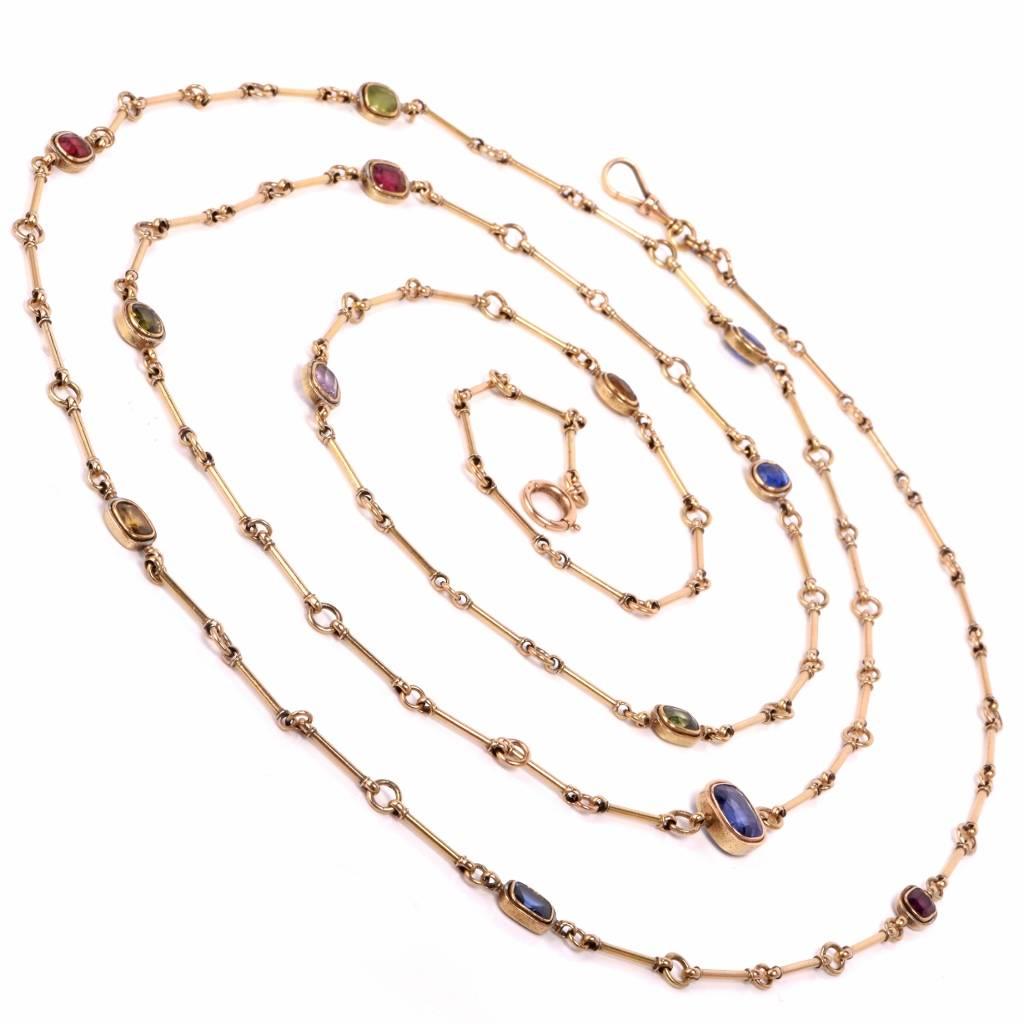 This antique Victorian long gold chain necklace is crafted in solid 18K yellow gold. The necklace is enriched with 5 genuine natural corundum blue sapphires weighing approx from 4.11ct to 0.90ct, with total carat weight 8.91cttw, 3 genuine cushion
