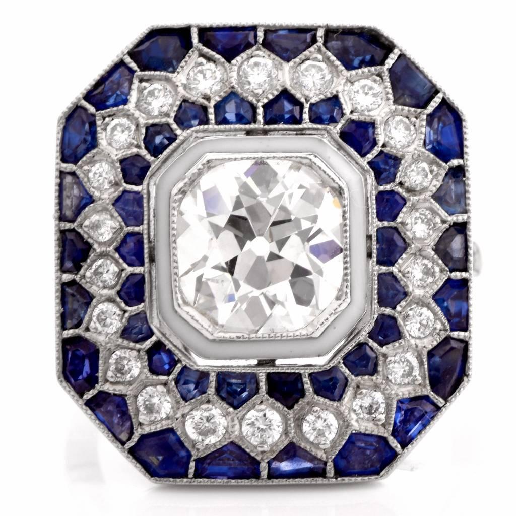 This elaborately designed  engagement ring of captivating beauty is crafted in solid platinum. Designed as a geometrically inspired octagonal plaque of contrasting colors, it is centered with a prominent2.15ct antique cushion-cut diamond, graded H