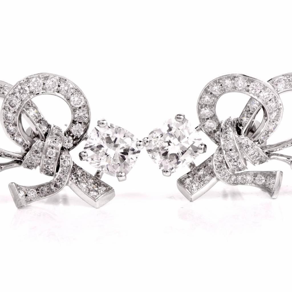 These stunning CHANEL diamond pearl French earrings are crafted in solid 18K white gold. They expose 2 cushion-cut genuine diamonds GIA certified (Reports # 6127934178, # 1126010123), total weight 2.40cttw, graded F color and VVS2 clarity, adorned