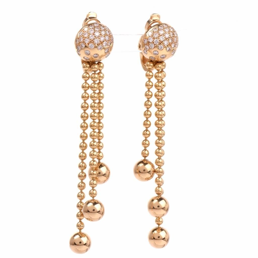 Dover Jewelry presents these eye catching diamond earrings by designer Cartier crafted in solid 18K yellow gold from the famous 