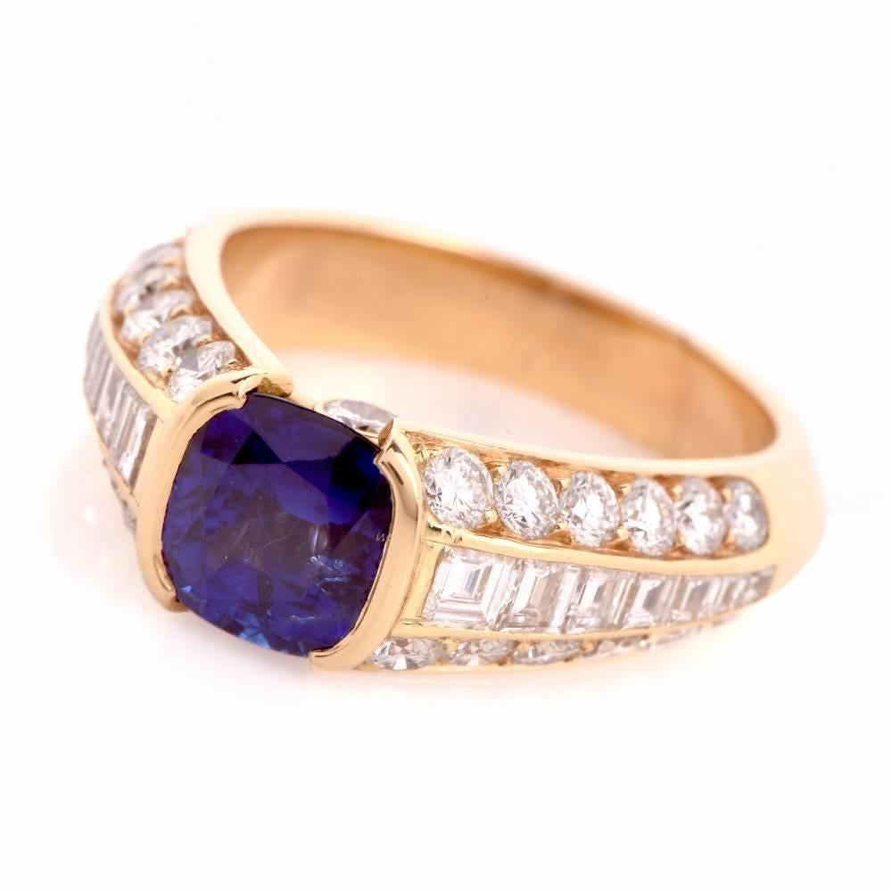 This elegant 18K gold French ring is centered with 1 genuine cushion cut Sapphire approx: 2.05cttw, channel set. Accented by 14 genuine high quality baguette cut Diamonds and 26 genuine round cut Diamonds approx: 1.81cttw, F-G color, VS1-VS2