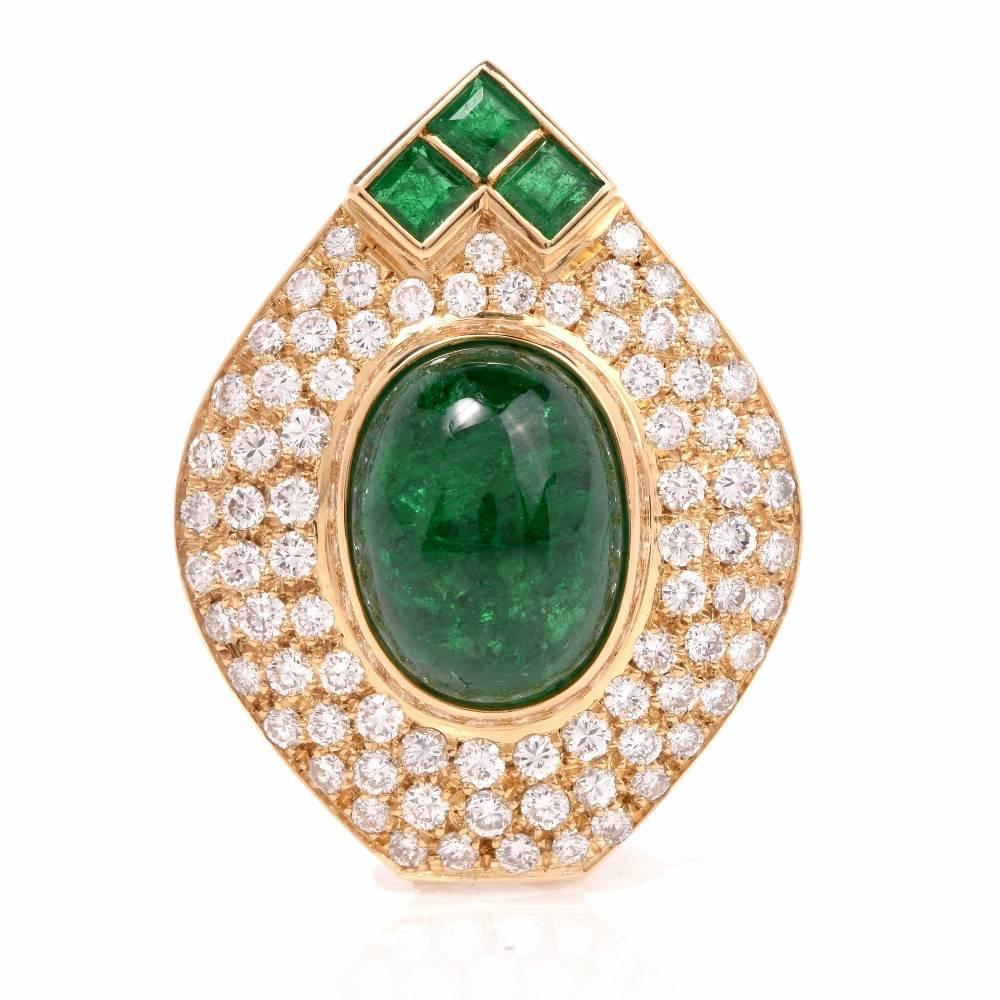 This opulent eye catching french made cocktail ring is centered with 1 genuine oval cabochon Emerald (with natural inclusions and minor cedar oil treatment) approx: 6.35cttw, bezel set and accented by 3 genuine square cut Emeralds approx: 0.58cttw,