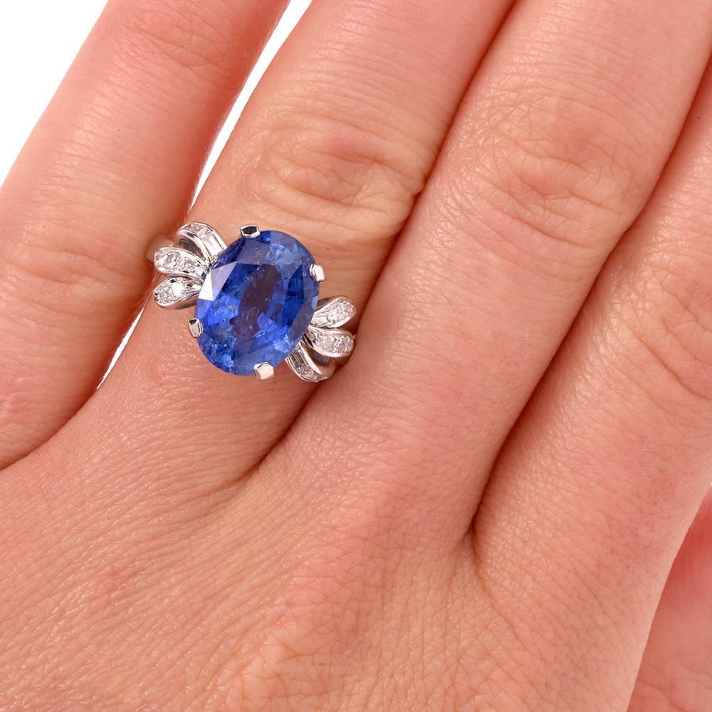 This beautiful antique diamond sapphire ring is crafted in platinum.  It exposes an oval-faceted natural corundum of an enchanting cornflower blue color from  Ceylon provenance. The eye-catching sapphire weighing approx. 6.07 cts, measuring 12.5mm x