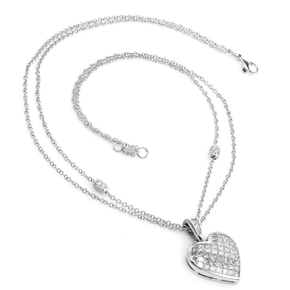 This alluring diamond pendant necklace is crafted in solid platinum with 18K white gold diamond chain. The heart pendant is channel-set with approx. 55 genuine princess-cut diamonds (including bale) approx 4.58cts graded H-I color and VS1-VS2
