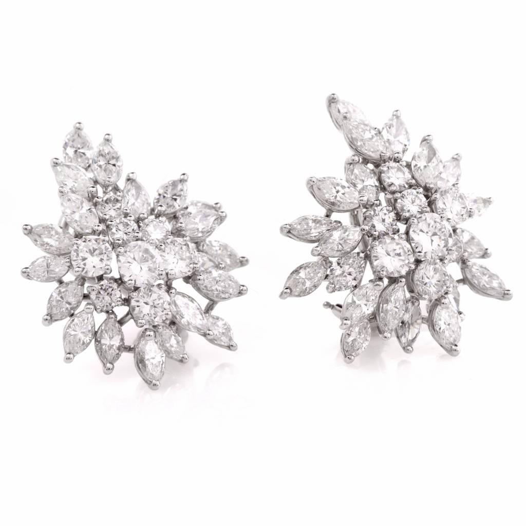 These precious clustered Estate Platinum diamond earrings are adorned with 58 genuine high quality marquise and round brilliant cut Diamonds ALL approx: 9.60cttw, G-H color, VS1-VS2 clarity,prong set. These fabulous earrings are and come with a