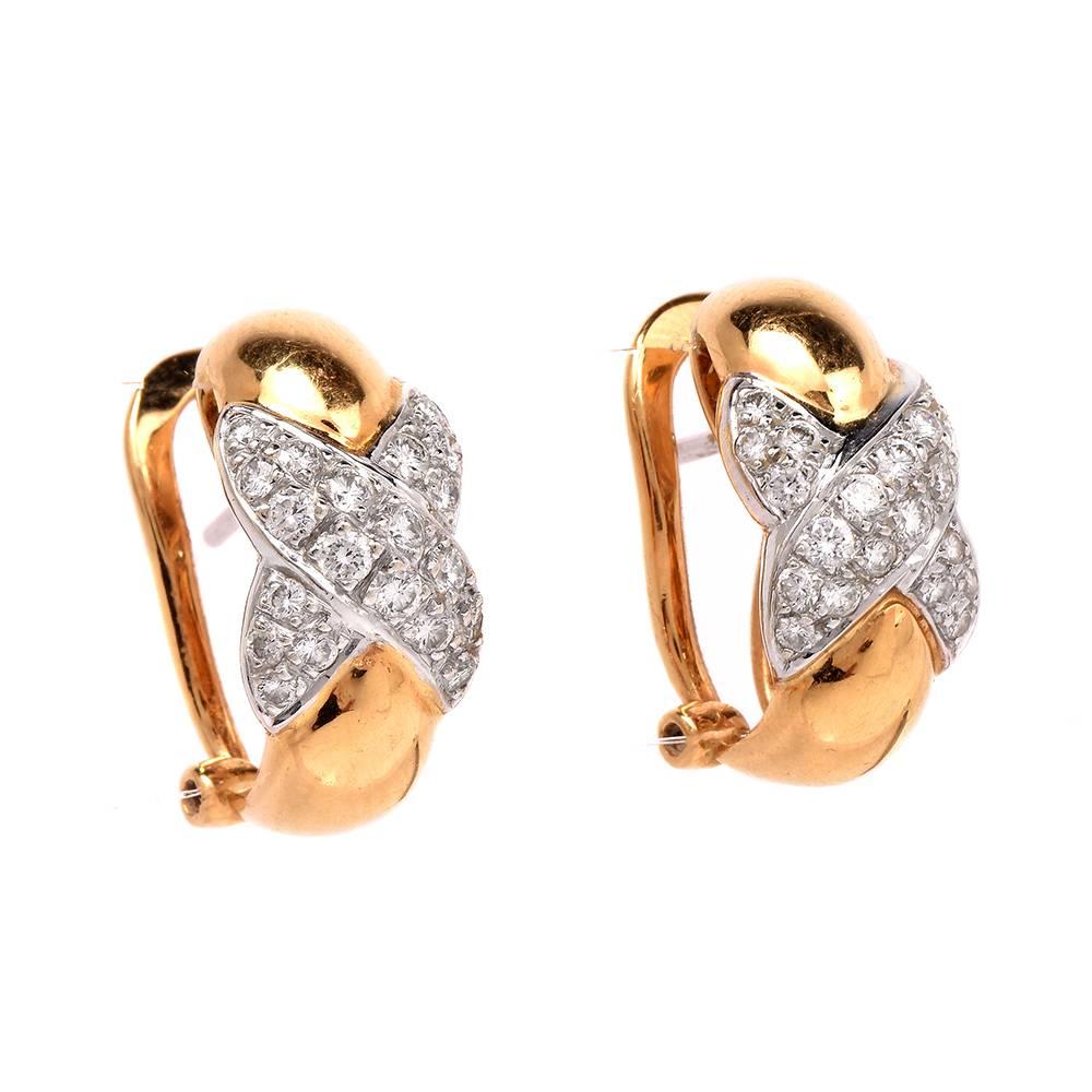 These lovely 18K yellow and white gold huggie earrings  feature an “X” design adorned with 20 genuine round cut diamonds approx: 0.45cttw, H-I color, VS1-VS2 clarity, set on solid 18K white gold, prong set. These charming clip-on earrings have