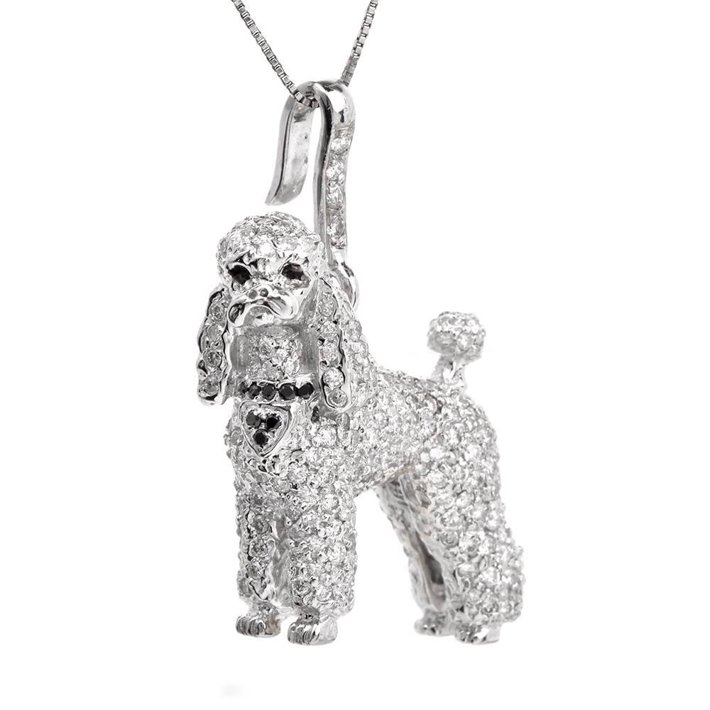 This precious pendant enhancer features a poodle dog figurine adorned throughout with some 288 round cut Diamonds approx: 4.32cttw, G-H color, Vs1-VS2 clarity, pave set. Its collar is accented with 8 genuine round cut black diamonds approx: