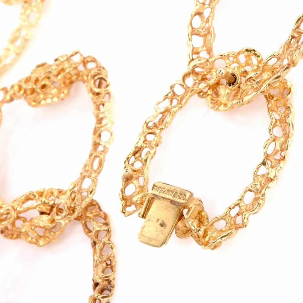 This circa 1960’s Tiffany & Co. necklace is crafted in solid 18K yellow gold, weighs 151 grams and measures 32″ long and 31 mm wide.The necklace incorporates 28 openwork links of bold aesthetic and ovular shape, creating a simple and stylish