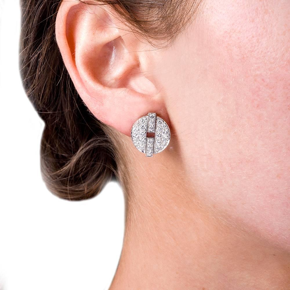 Cartier’s Himalia collection is famous for its beauty and its simplicity. These gorgeous delicate famine earrings are made of 18K white gold and features with lovely pave set diamonds approximately 1.51 carats total, E-F color VVS clarity. They come