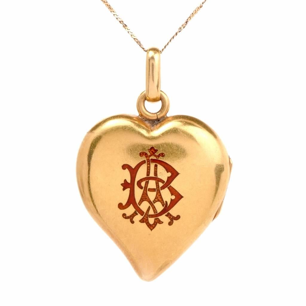 This rare antique locket pendant is crafted in 18K yellow gold, weighing 23.1 grams and measuring 40 mm long (including bail) and 26 mm wide. The pendant comprises a locket which can hold a photograph or a souvenir of sentimental value. The two