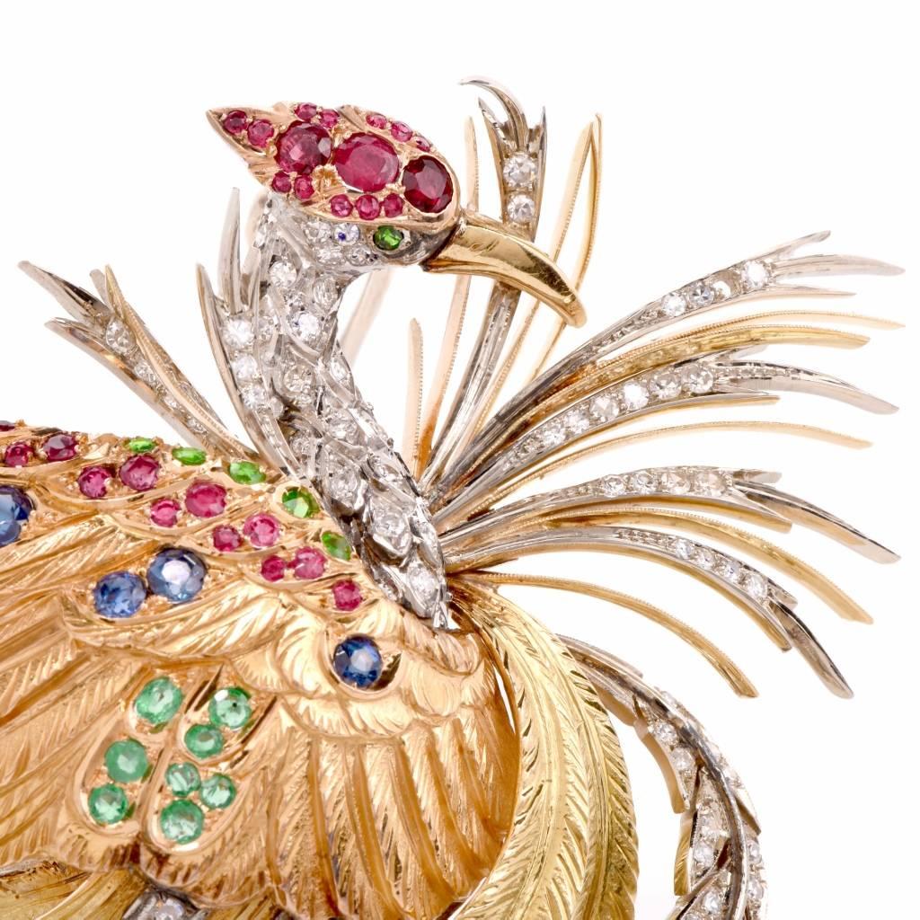 This impressive vintage Retro brooch of opulent aesthetic is hand crafted in a combination of solid 18K yellow, rose and white gold.  Depicting the sculptured silhouette of a bird, this unique Retro brooch is adorned with 2.30cts of round-cut