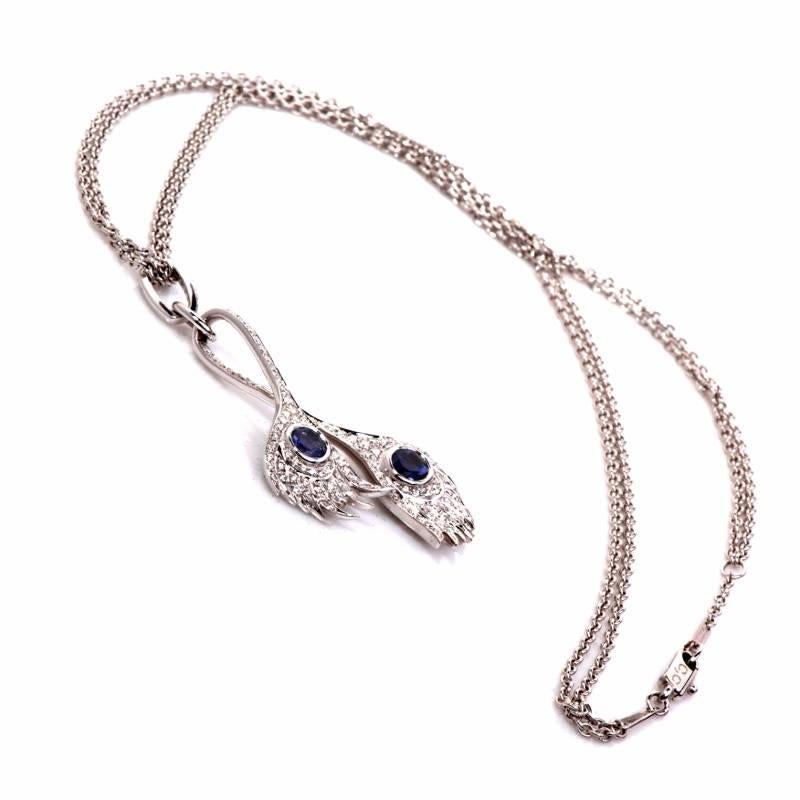This lovely, Carrera Carrera Pendant Necklace from peacock collection is crafted in solid 18K white gold. This pendant features a lovely peacock feather design with 2 genuine bezel set round tanzanites approx. 1.40 cttw and close to 100 beautiful