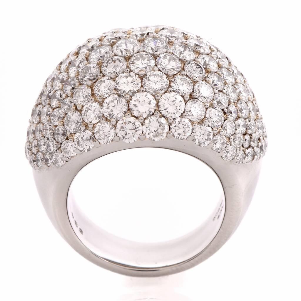 This captivating estate  ring with pave diamonds is designed as a bombé plaque, pave-set with 8.43cts of large round-faceted diamonds graded I color and VS1-VS2 clarity. The ring is crafted in solid platinum, combine with 18K yellow gold applied to