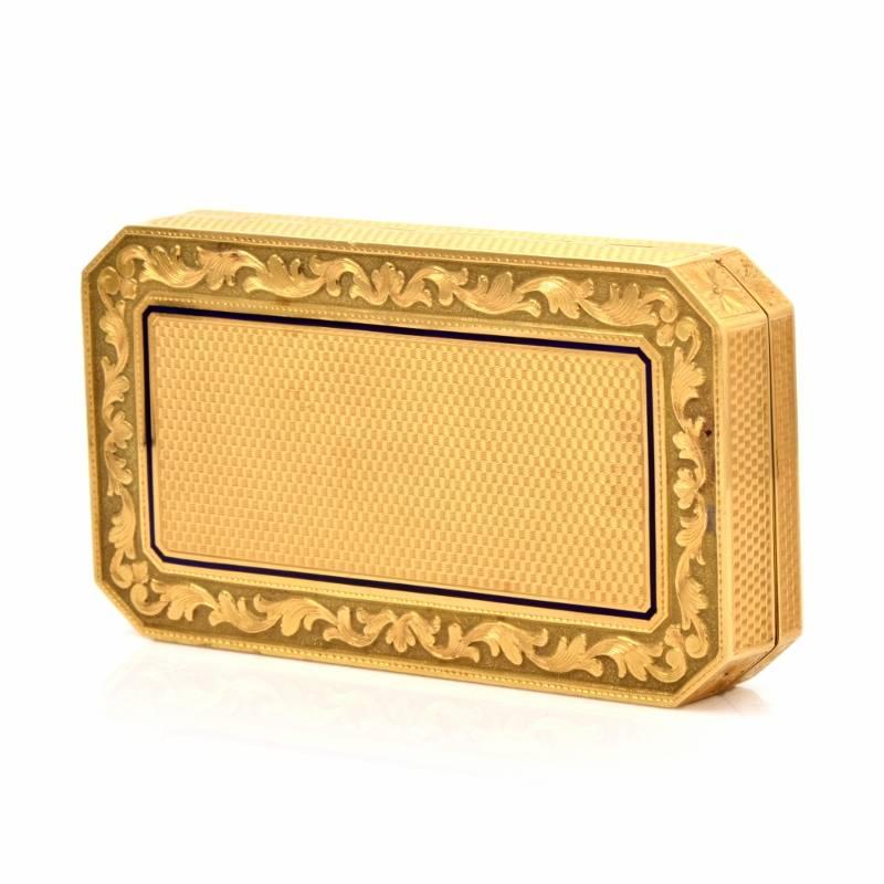 This Vintage retro compact box with Guilloche enhancement , blue cobal enamel and botanically inspired relief borders is crafted in solid 18K yellow gold, weighs approx. 145.7 grams and measures 3.6" long and 1.9" wide. Designed as a