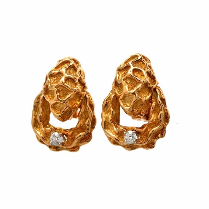 These exquisite vintage French earrings are crafted in solid 18K yellow gold. These nugget type earrings are accented with 2 genuine round European cut diamonds approx. 0.75 cttw, H-I color, VS clarity, prong set. Made with security clip backs for