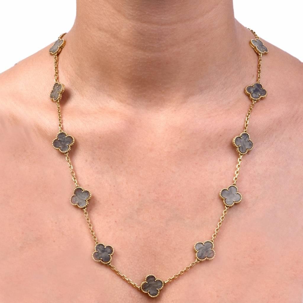 This very desirable Vintage VCA alhambra Necklace is made in solid 18 Karat Gold. It Composed of 20 quatrefoil-shaped links with brown stone, weighing approximately 43.1 Grams, length 32 inches, signed VCA and numbered in mint condition.

The very