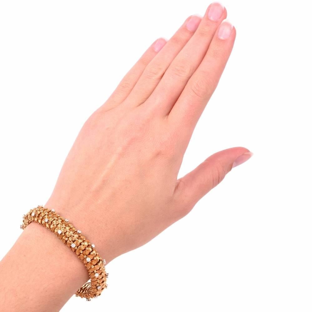 This 1950’s bracelet is artfully designed and meticulously crafted in solid 18K in matte and polished yellow gold. Simulating a fascinating woven basket pattern, this exquisite Retro bracelet is embellished with 32 prong-set round-faceted diamonds