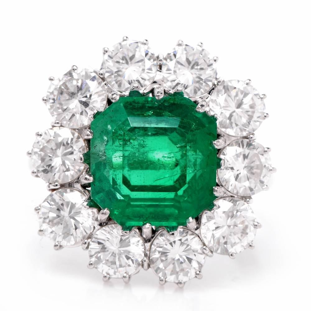 This sumptuous  Lady Dianna style vintage ring with a beautifully cut Assher-Cut emerald of enchanting translucent green color high quality diamonds is crafted in solid 18K white gold. The centrally positioned vibrant emerald weighs 4.20carats,