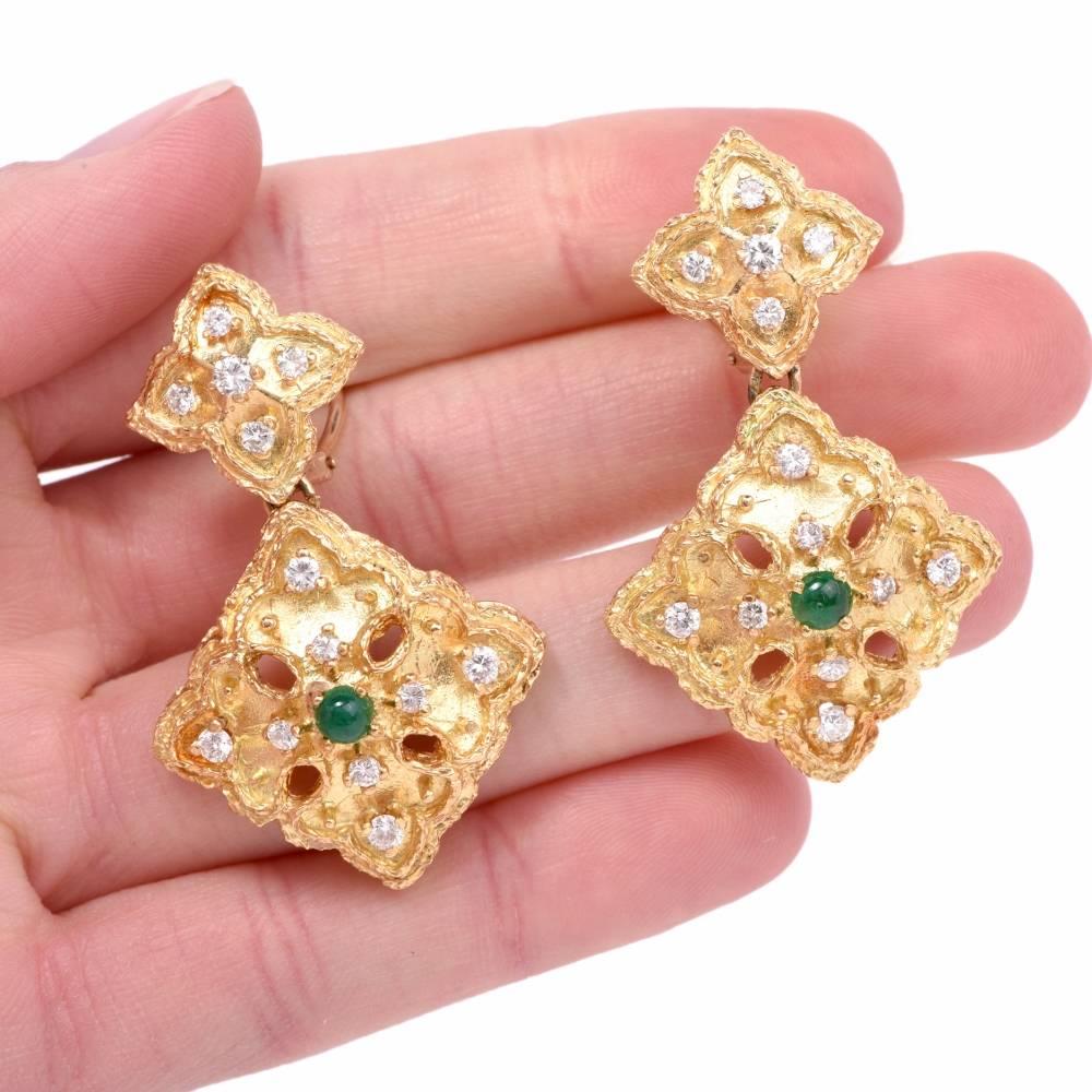 These stunning earrings from 1970’s feature a floral design centered with 2 genuine round cabochon Emeralds  approx. 0.50 carats, prong set and adorned with 26 genuine round cut white Diamonds approx: 1.48 carats, G-H color, VS1 clarity, prong set.